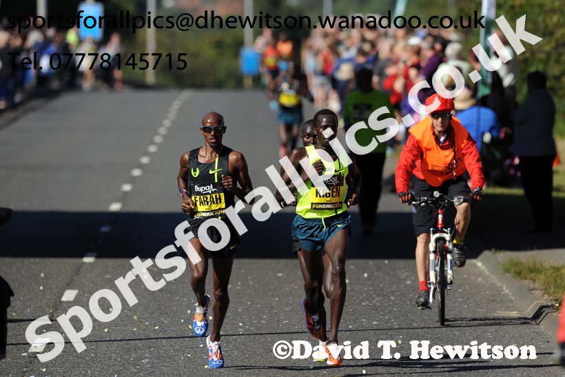Mo Farah, Mike KIgen and Thomas Ayeko break away in the mens 2014 BUPA Great North Run. Photo: David T. Hewitson/Sports for All Pics